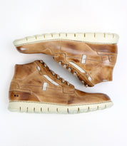 A pair of Bed|Stü Galahad tan leather high-top sneakers with a lightweight sole and white rubber accents, displayed side by side on a white background.
