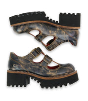 A pair of Bed|Stü Gear women’s shoes in distressed brown leather, featuring a double-strap design, thick black XL Extralight lug soles, and visible stitching, are displayed side by side on a white background.
