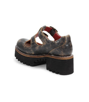 A single Bed|Stü Gear women’s Mary Jane shoe in distressed brown is shown from a back side angle, highlighting its double-strap design, chunky black block heel, and textured XL Extralight sole.