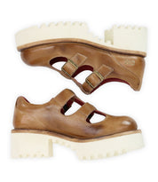A pair of Bed|Stü Gear women’s shoes in brown leather, featuring a stylish double-strap Mary Jane design and chunky white treaded XL Extralight soles; shown in side view with the soles facing opposite directions.