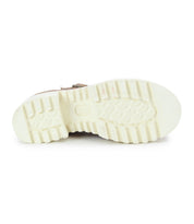 The image shows the bottom view of the Bed|Stü Gear women's shoe, featuring a thick, white, patterned rubber sole designed for traction.