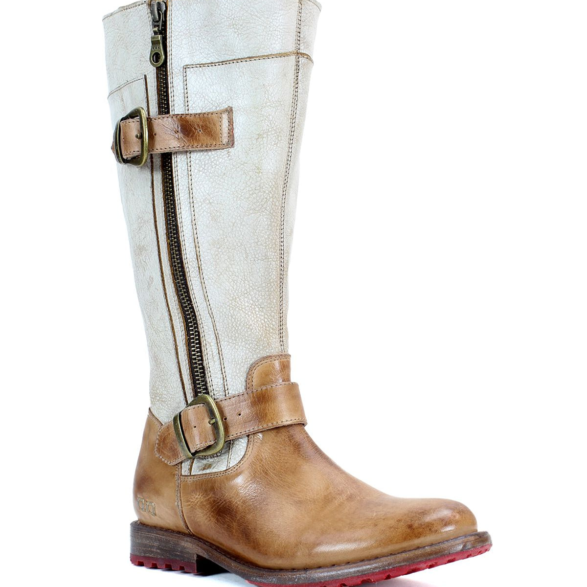 The Bed|Stü Gogo Lug Wide Calf is a tall, brown and beige leather mid-calf boot featuring a side zipper, two buckles, and a low red-tread sole, displayed on a white background.