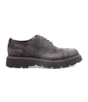A single Grant lace-up dress shoe by Bed|Stü, crafted from dark brown Italian leather with a rugged black rubber sole, is displayed in side profile against a white background.
