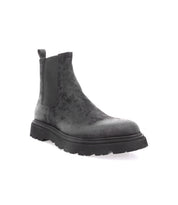 A single Bed|Stü Grit Men's Chelsea boot in dark gray oiled suede, featuring a textured finish, elastic side panel, pull tab, and thick black lug sole, displayed on a white background.