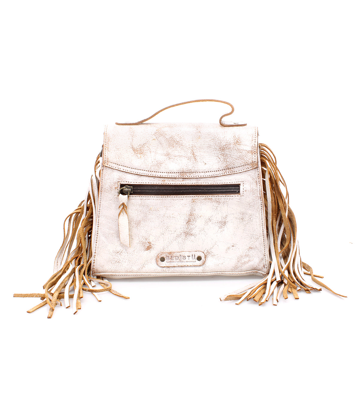 Bed|Stü Hidden handbag in beige soft leather, featuring a structured silhouette, a front zipper pocket, top handle, and long fringe detailing on both sides, displayed against a white background.