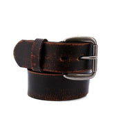 The Bed|Stü Hobo is a coiled dark brown leather strap belt with a distressed finish and a silver metal buckle, displayed against a white background—perfect for elevating your everyday style.