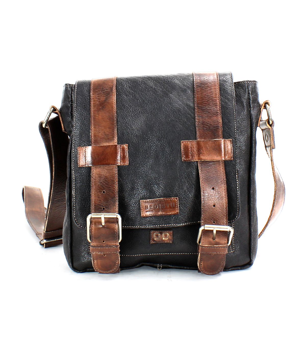 Introducing Hue by Bed|Stü—a black leather messenger bag accented with brown leather straps and brass buckles, designed with an adjustable crossbody strap and a secure front flap closure. Perfect for seamlessly transitioning from work to weekend.