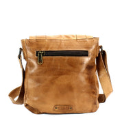 The Bed|Stü Hue is a light brown leather messenger bag featuring an adjustable crossbody strap, a convenient front zip pocket, and an embossed "Bed|Stü" logo at the bottom—making it ideal for effortlessly transitioning from work to weekend.