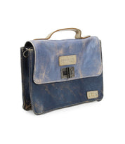 Improv mini purse satchel by Bed|Stü in distressed blue leather, featuring a top handle, metal clasp, and a rectangular label on the front, set against a white background.