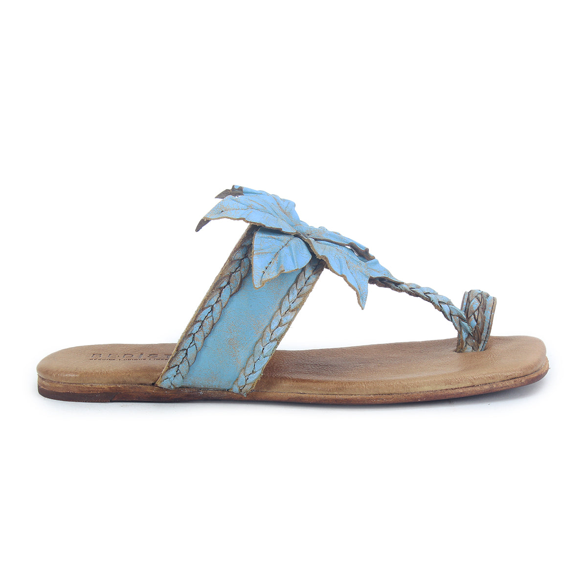 Discover the Isobel sandal by Bed|Stü—a single blue leather flat featuring a braided strap, decorative leaf accents, and a stylish toe loop, shown in profile view—an ideal finishing touch for your summer outfits.