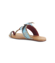 Introducing the Isobel by Bed|Stü: a flat leather sandal featuring an open toe design, a tan sole, and blue braided straps—perfect for effortless summer looks. Shown here against a white background.