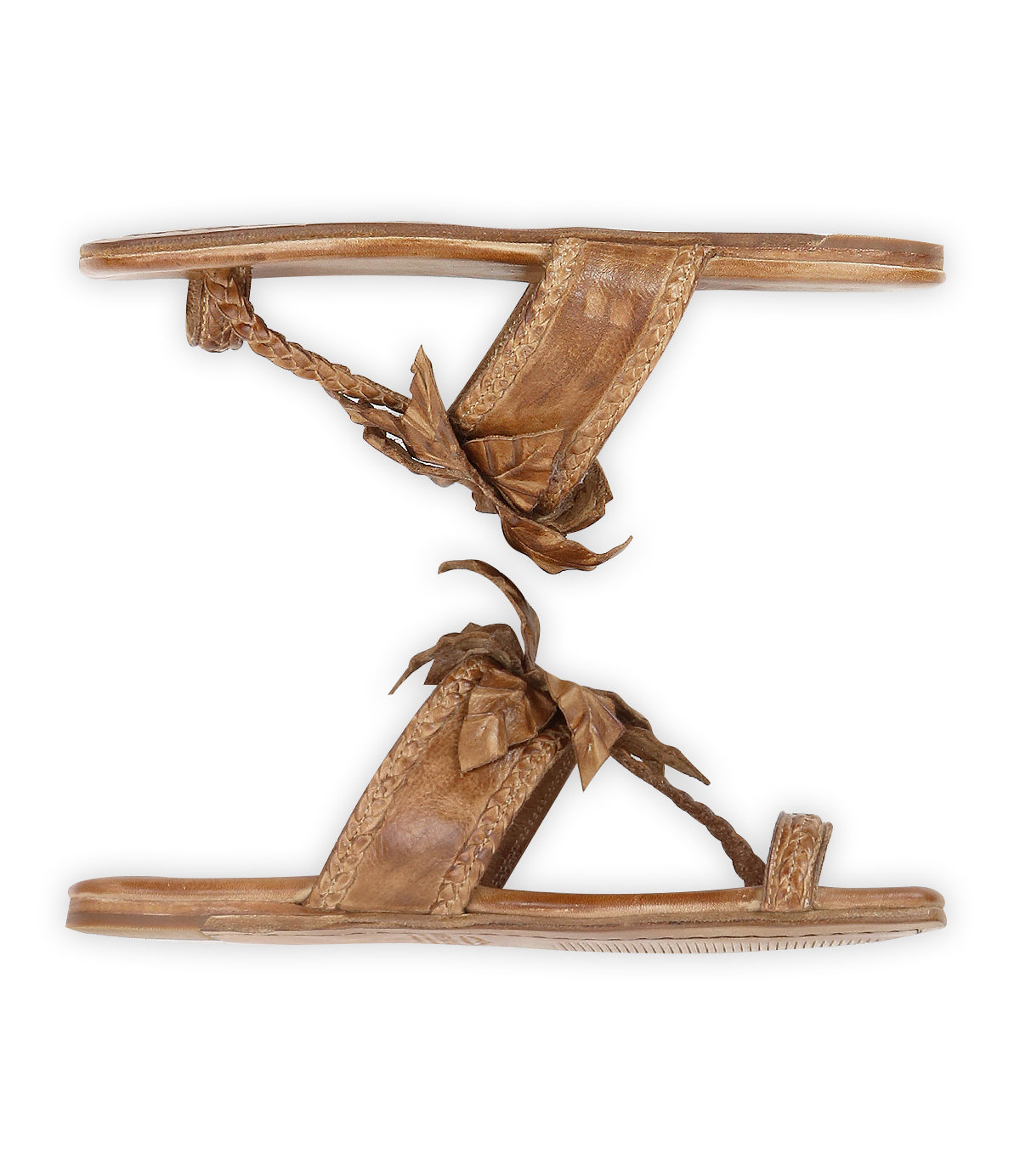 The Isobel sandals by Bed|Stü are flat brown leather sandals featuring braided straps and decorative bows, perfect for completing your favorite summer looks. Shown from the side on a white background.