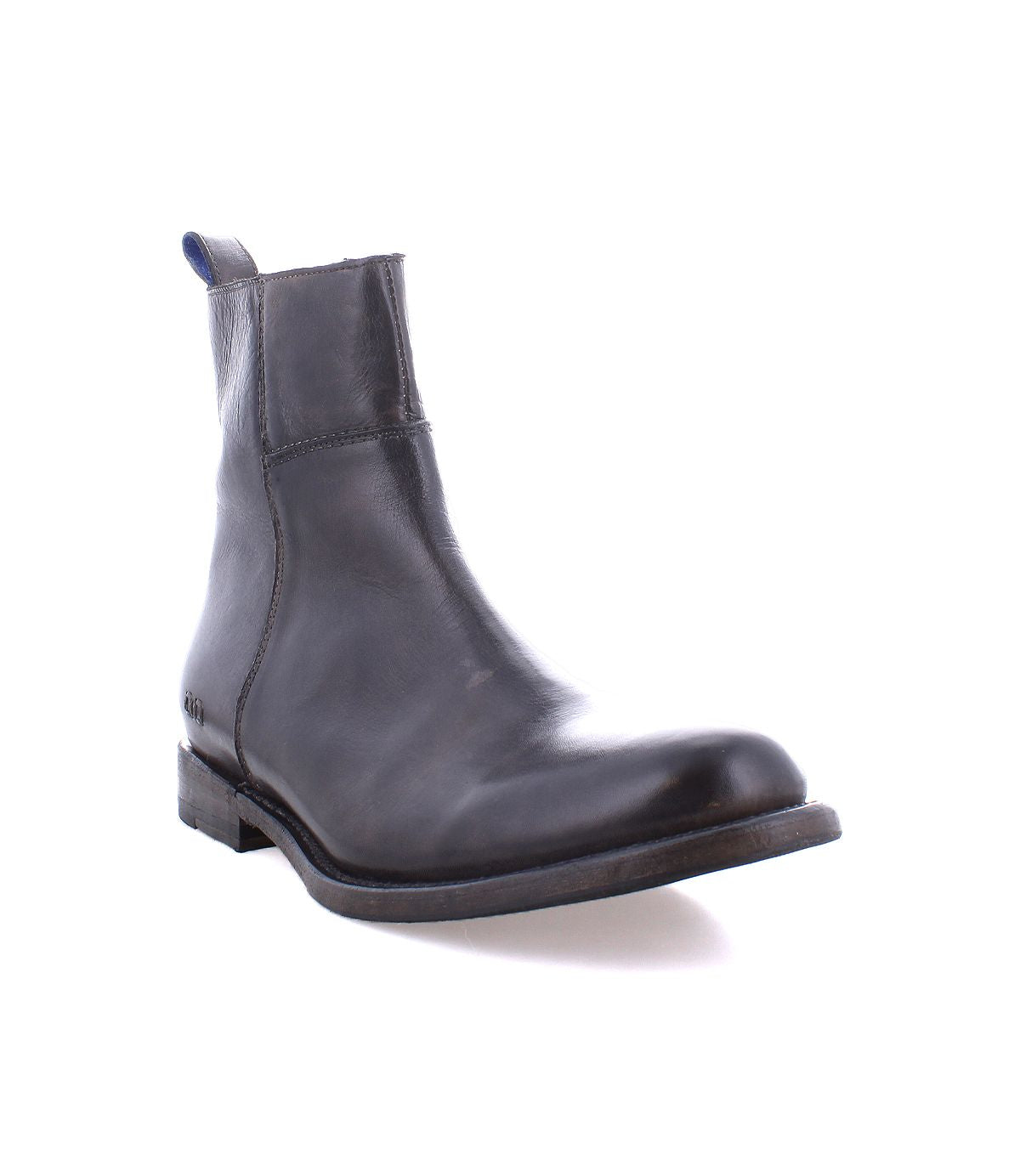 The Bed|Stü Kaldi is a classic black leather ankle boot featuring a low heel and pull tab, displayed against a white background.
