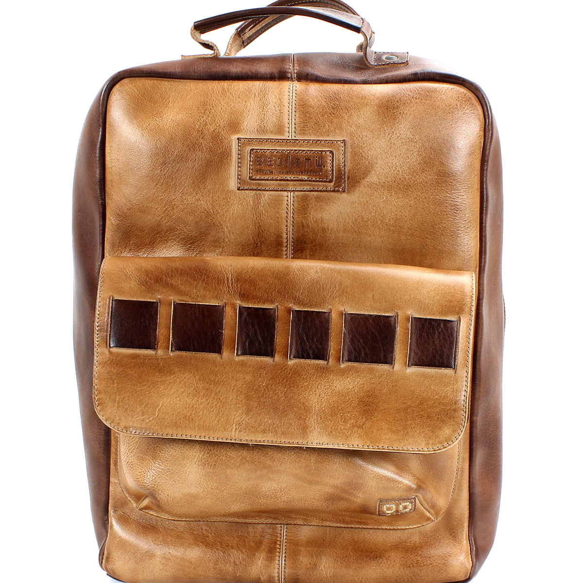 Introducing the Kamet by Bed|Stü—a rectangular laptop bag in tan and brown, featuring a front pocket, top handle, signature decorative square cutouts, visible stitching, and expertly crafted from premium vegetable-tanned leather.