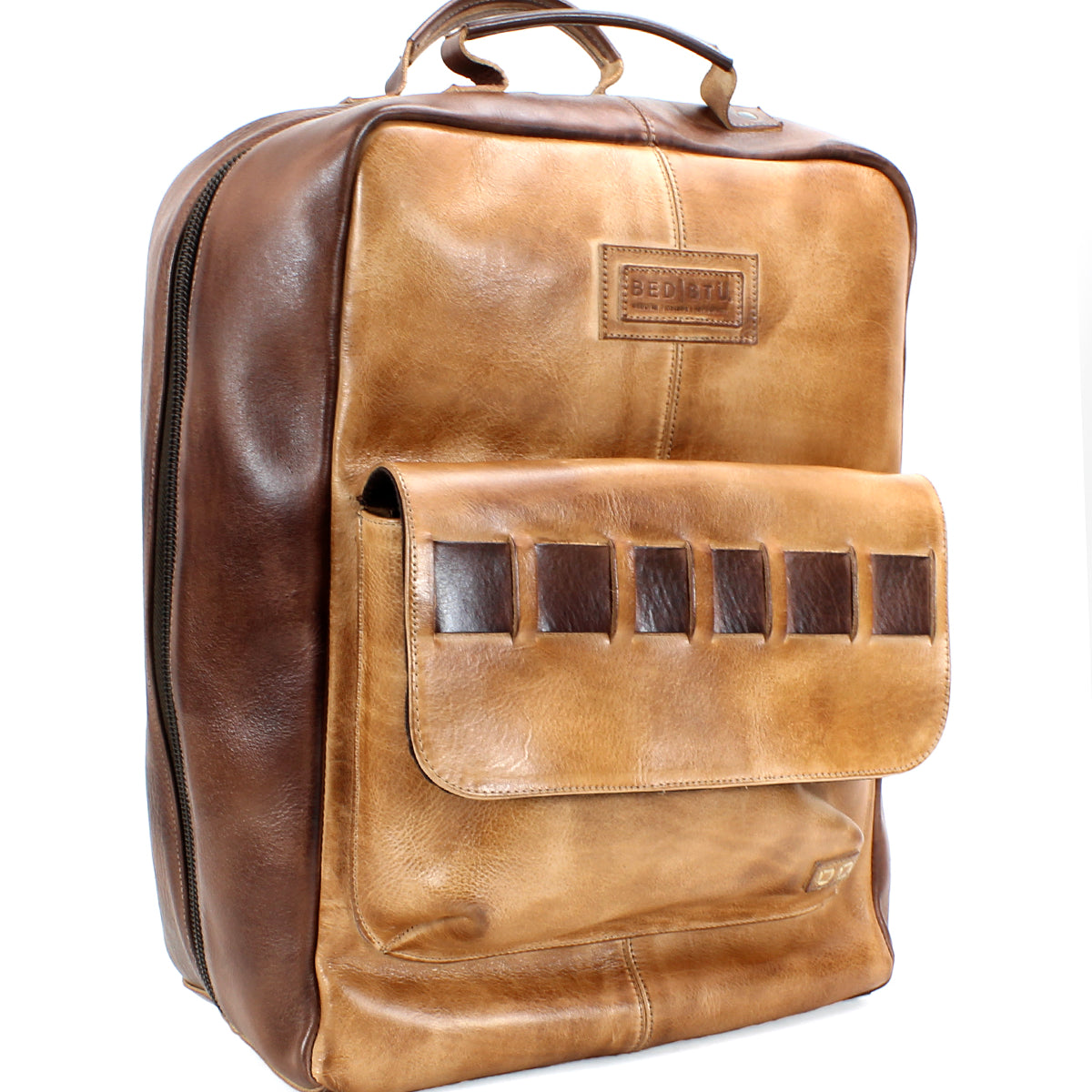 The Kamet laptop bag by Bed|Stü is crafted from vegetable-tanned tan and brown leather, featuring a front flap pocket, sturdy top handle, and visible stitching. Woven leather accents and an embossed Bed|Stü logo on the front further enhance its refined design.