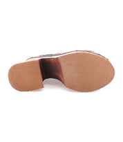 The image shows the bottom view of a single Bed|Stü Karaoke brown lace-up shoe, featuring its flat, smooth sole and a raised heel section reminiscent of a classic 70s shoe.