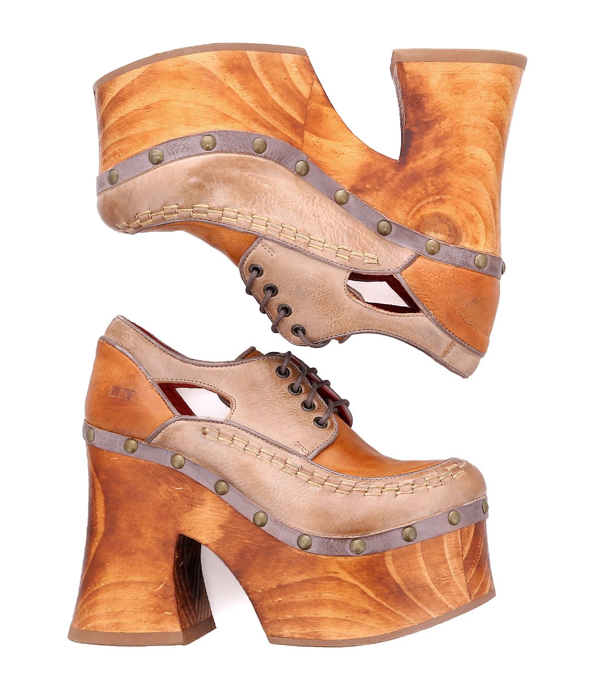 A pair of Bed|Stü "Karaoke" vintage 70s shoes featuring chunky wooden platform heels, tan leather uppers, decorative studs, and cutout side details, photographed on a white background.