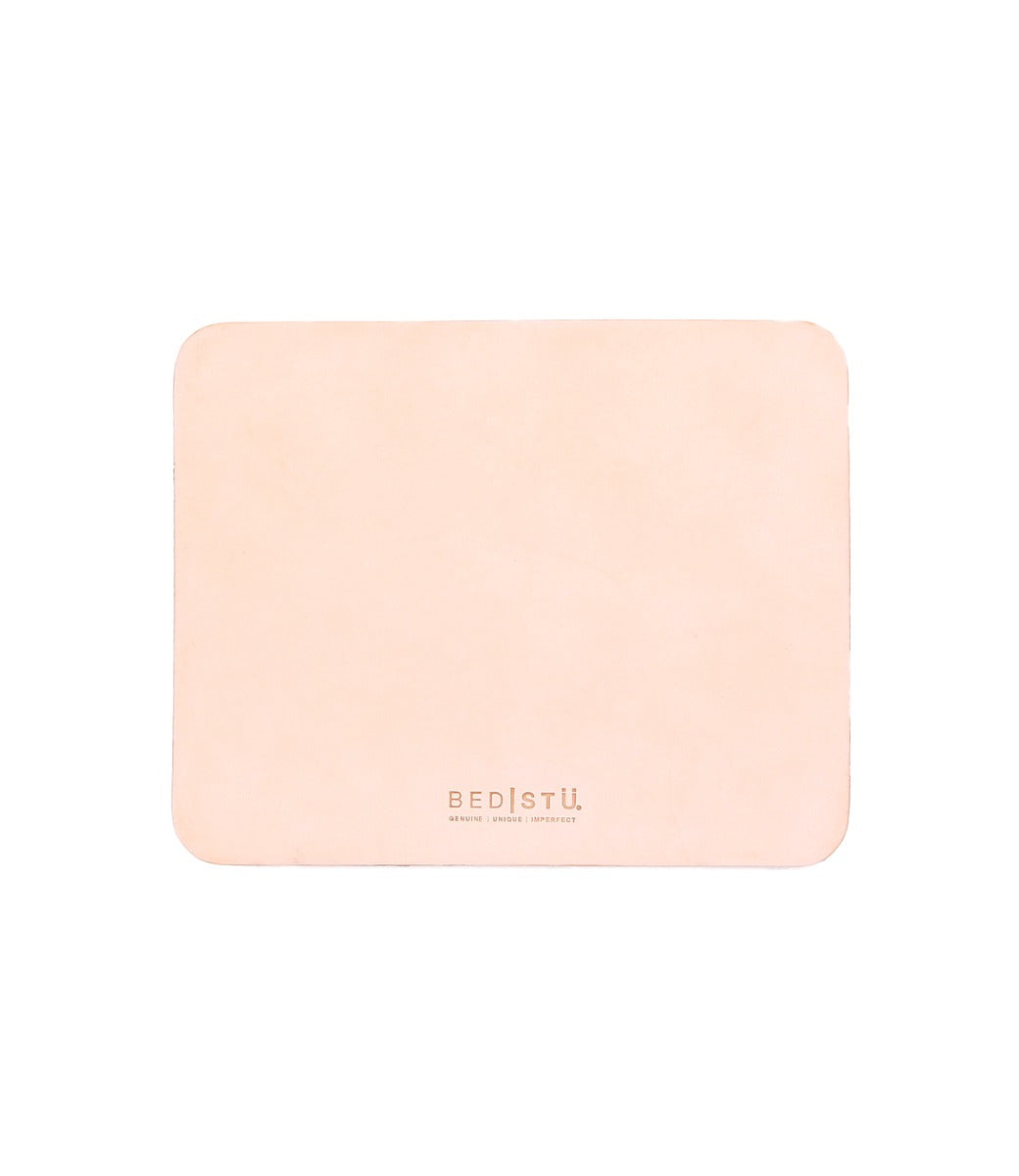 Rectangle beige leather Launcher Mouse Pad with rounded corners, featuring the Bed|Stü logo and tagline printed in small text near the bottom center. This versatile workspace accessory is perfect for enhancing your desk setup. Shown on a plain white background.