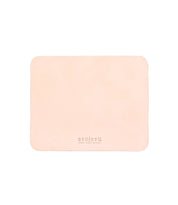 Rectangle beige leather Launcher Mouse Pad with rounded corners, featuring the Bed|Stü logo and tagline printed in small text near the bottom center. This versatile workspace accessory is perfect for enhancing your desk setup. Shown on a plain white background.
