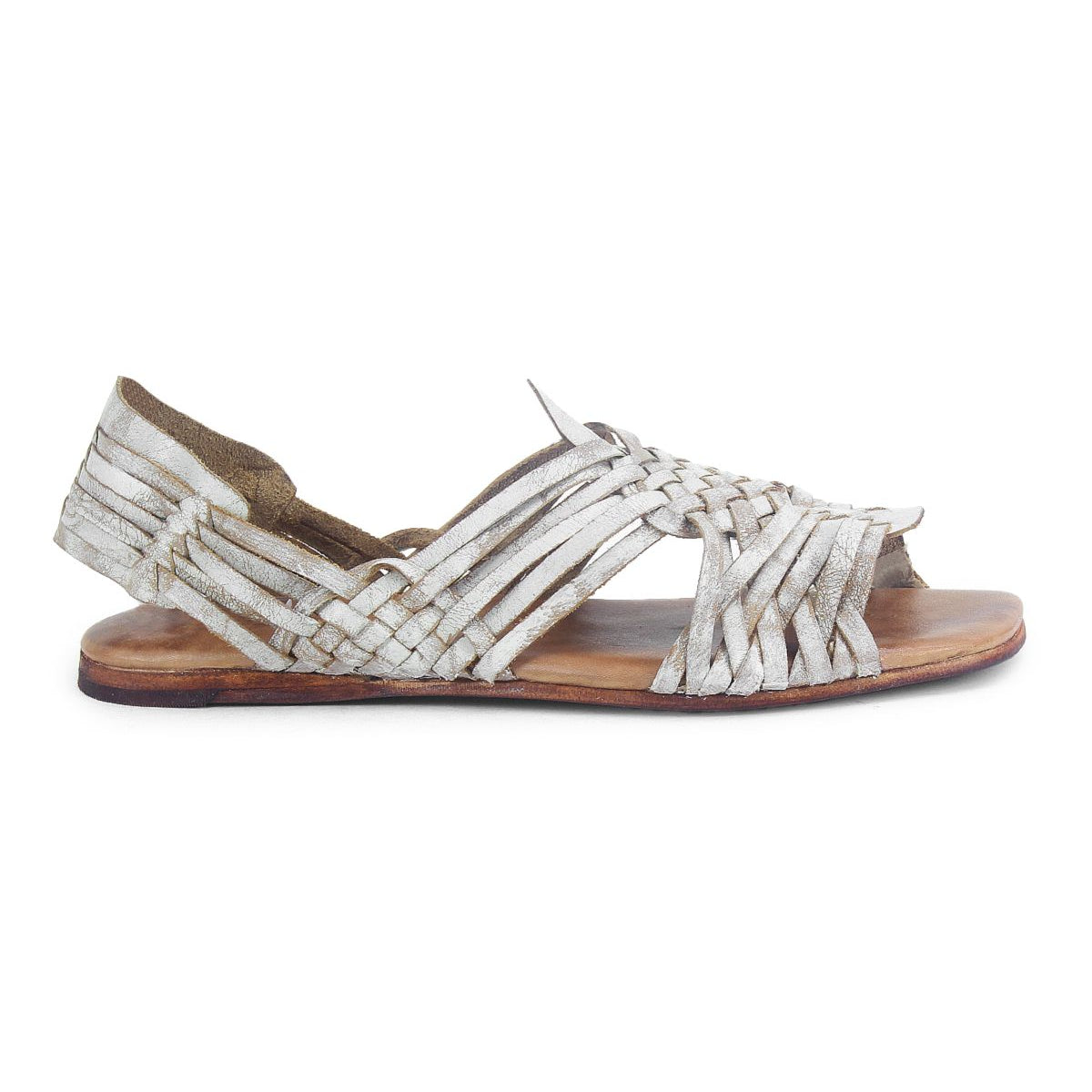 The Lauren II by Bed|Stü is a handmade, flat huarache sandal featuring woven straps and an open toe, displayed in a side profile view against a white background.