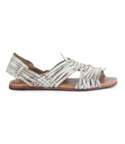 The Lauren II by Bed|Stü is a handmade, flat huarache sandal featuring woven straps and an open toe, displayed in a side profile view against a white background.