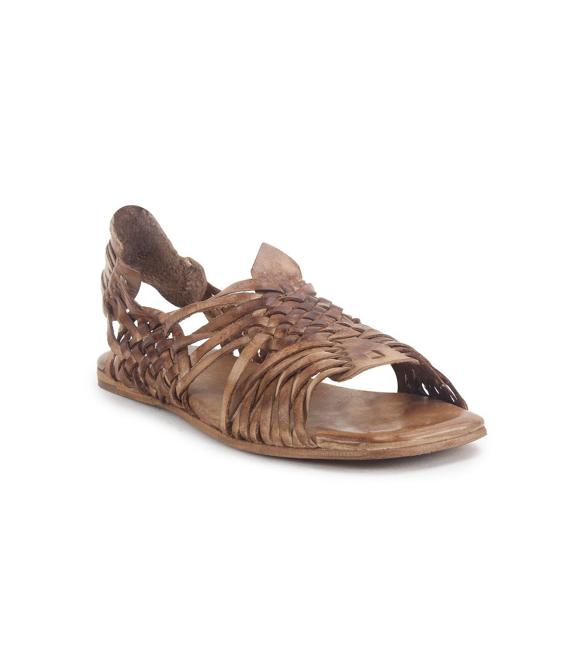 The Lauren II by Bed|Stü is a single brown, hand-woven leather huarache sandal featuring a closed heel, open toe, and flat sole, displayed against a white background. This handcrafted sandal highlights the brand's commitment to traditional artistry and timeless style.
