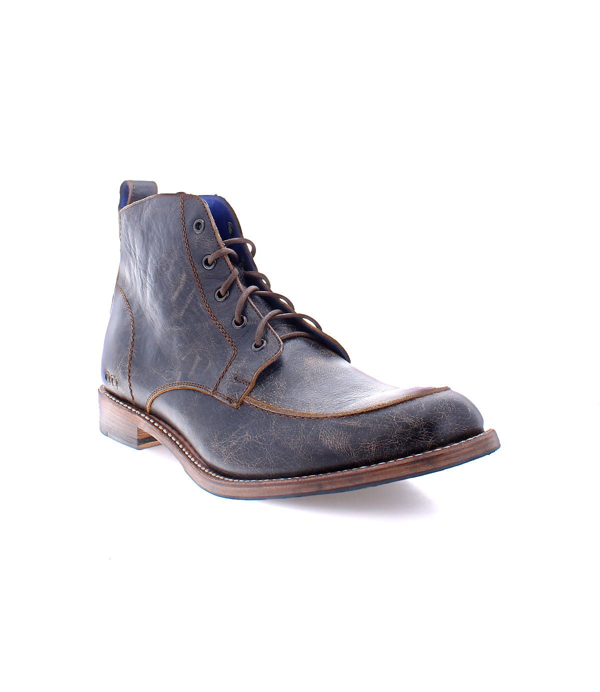 A single Lincoln II work boot by Bed|Stü, crafted from dark brown leather with an apron toe, visible stitching, low heel, and a slightly worn finish, is displayed on a white background.