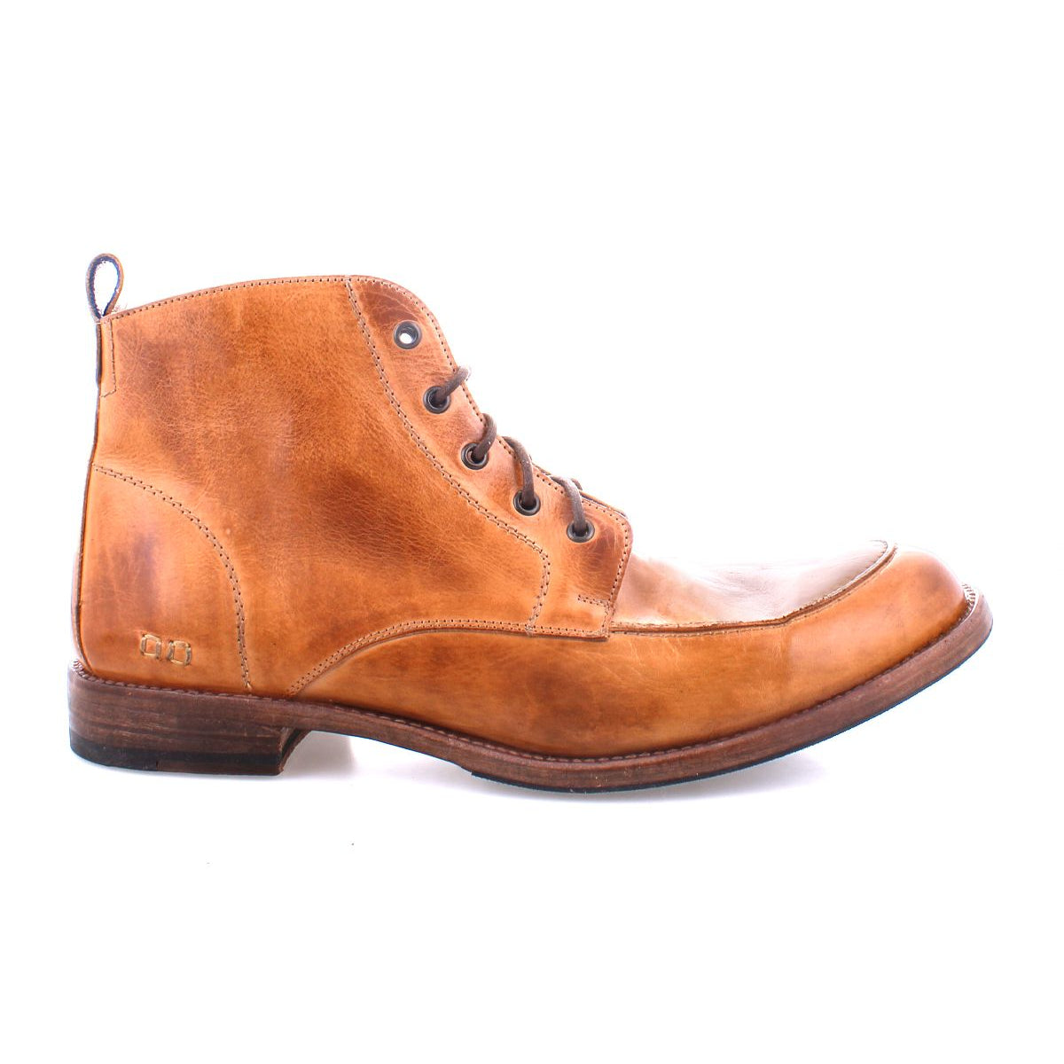 The Bed|Stü Lincoln II is a men's brown leather boot featuring an apron toe, lace-up front, side stitching accents, and a low wooden heel in a classic work-boot silhouette, displayed in profile against a white background.