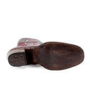 The image shows the sole of the Bed|Stü Locate brown leather Western boot, featuring visible stitching and metal tacks on the heel.