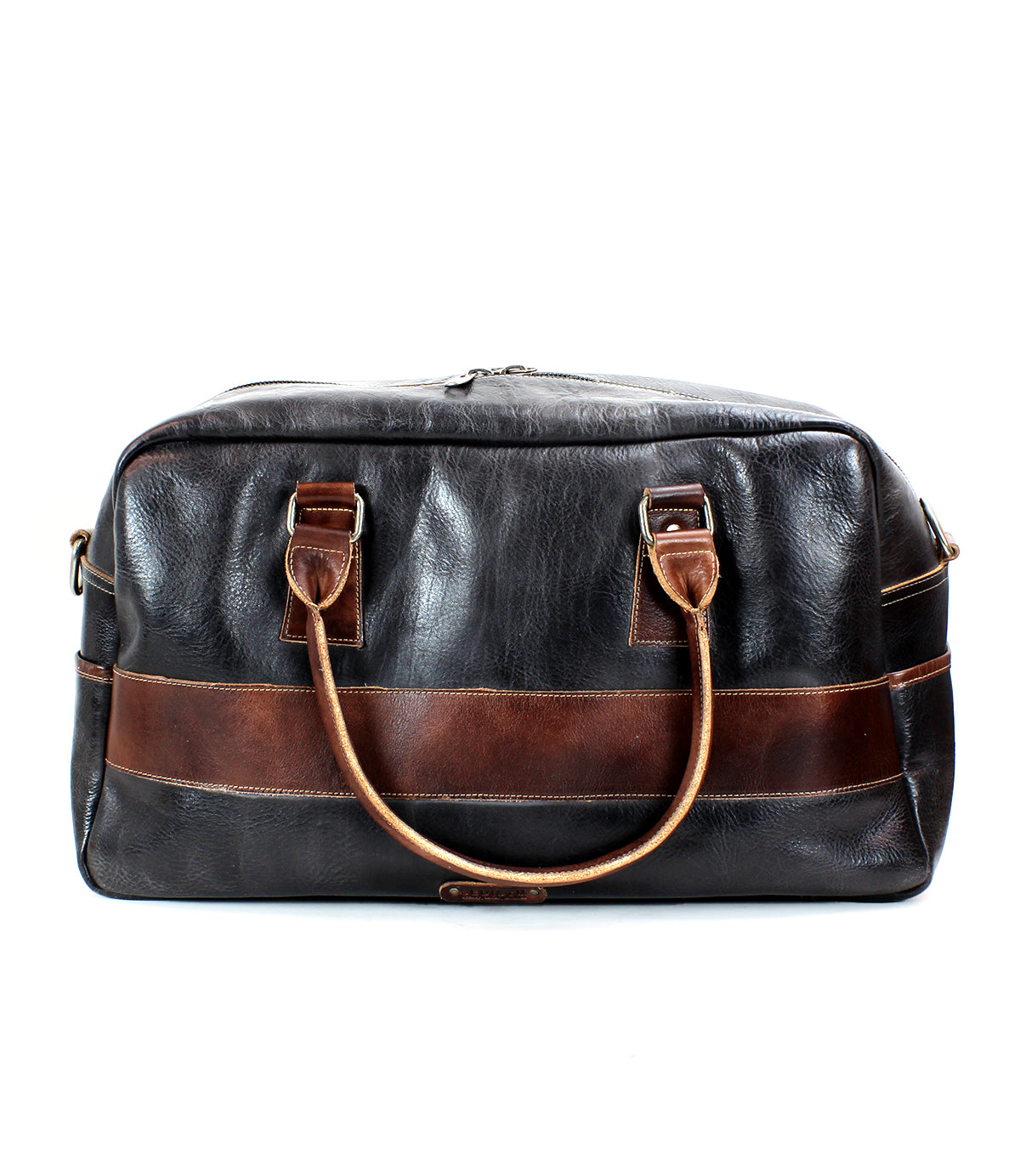 The Bed|Stü Luke, a large black travel bag crafted from vegetable-tanned leather, featuring brown leather handles and a horizontal brown stripe across the front, is displayed against a plain white background.