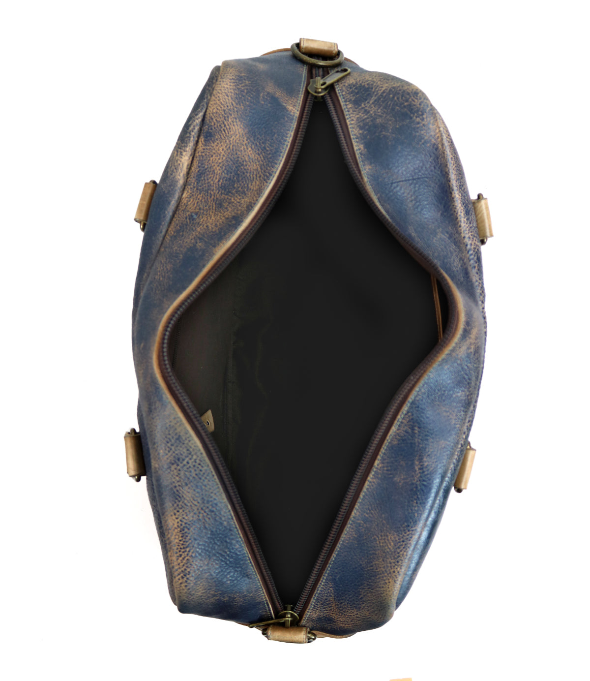 Top view of the Bed|Stü Luke, an empty oversized duffle bag crafted from blue-brown distressed vegetable tanned leather, with a partially open zipper revealing its dark interior, displayed against a white background.