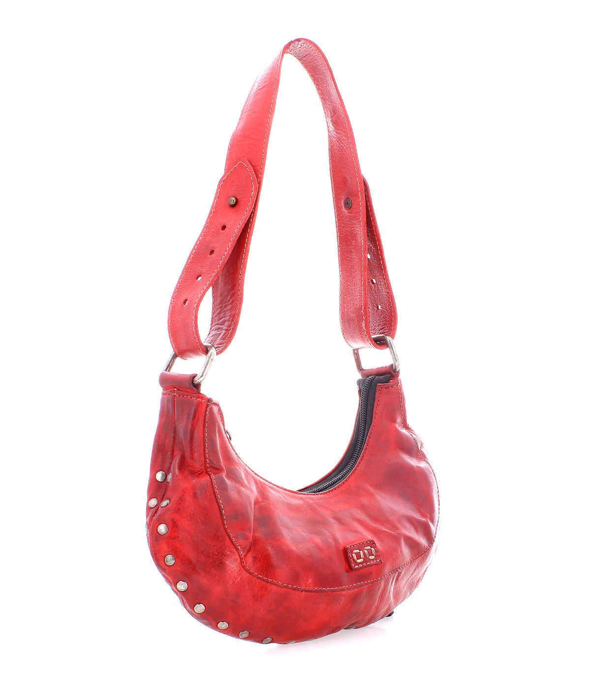 Make a statement with the Bed|Stü Madre shoulder bag, crafted from bold red leather and accented with silver metal studs along the sides. It features a wide adjustable strap and a zippered opening for an edgy look.
