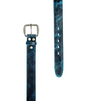 The Meander belt by Bed|Stü is displayed laid flat on a white background, featuring rugged blue leather and an antique metal buckle with visible belt holes.