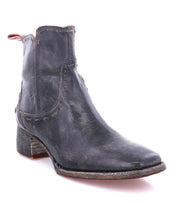 The Merryli ankle boot by Bed|Stü is shown in black leather, featuring a low heel, visible hand-stitched detailing, and a slightly pointed toe against a white background.