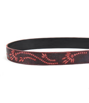 Discover the Mohawk by Bed Stu: a dark leather belt adorned with red, embossed floral patterns and intricate embroidered details.