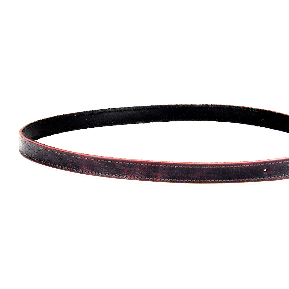 The Monae leather belt by Bed|Stü, featuring red-edged detailing and a classic buckle, is coiled in a partial circle against a white background—making it a stylish staple for any everyday wardrobe.