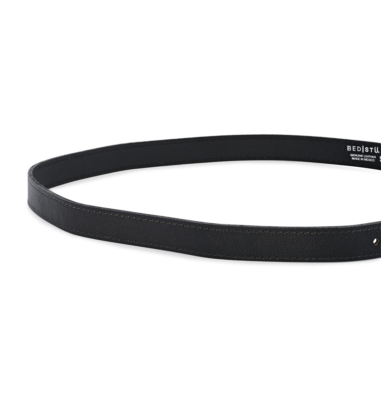 Introducing the Monae by Bed|Stü—a slim black leather belt with visible stitching and a classic buckle. Showcasing a partially visible Bed|Stü label on the right side against a white background, this timeless accessory is perfect for elevating your everyday wardrobe.