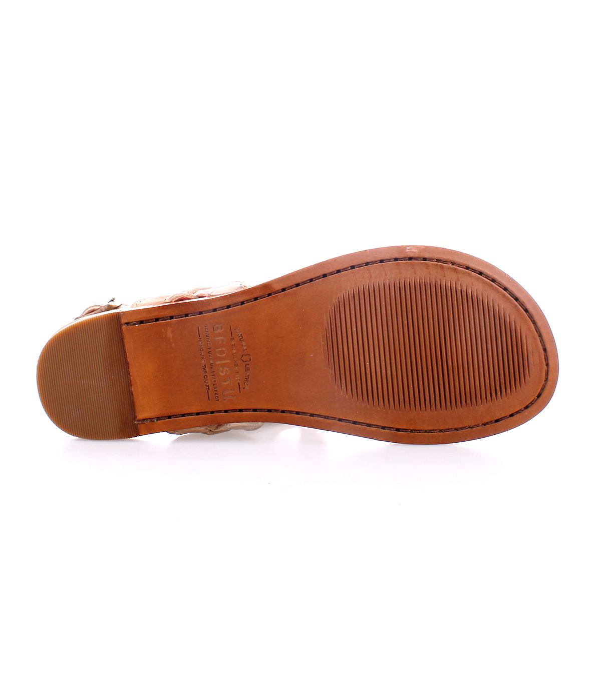 The image shows the sole of the Bed|Stü Moon sandal, crafted from brown leather with visible stitching, a textured grip, and branding details stamped near the arch. This classic style is designed for comfort and durability.