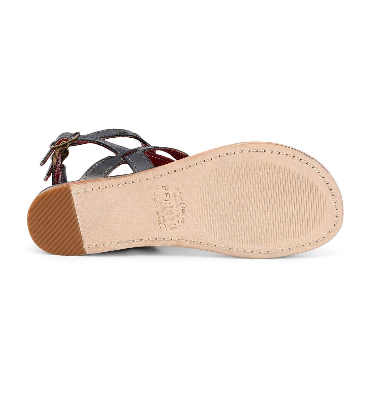 The image shows the bottom view of a single Bed|Stü Moon leather sandal, featuring a smooth beige sole, a textured heel, and visible stitching around the edge.