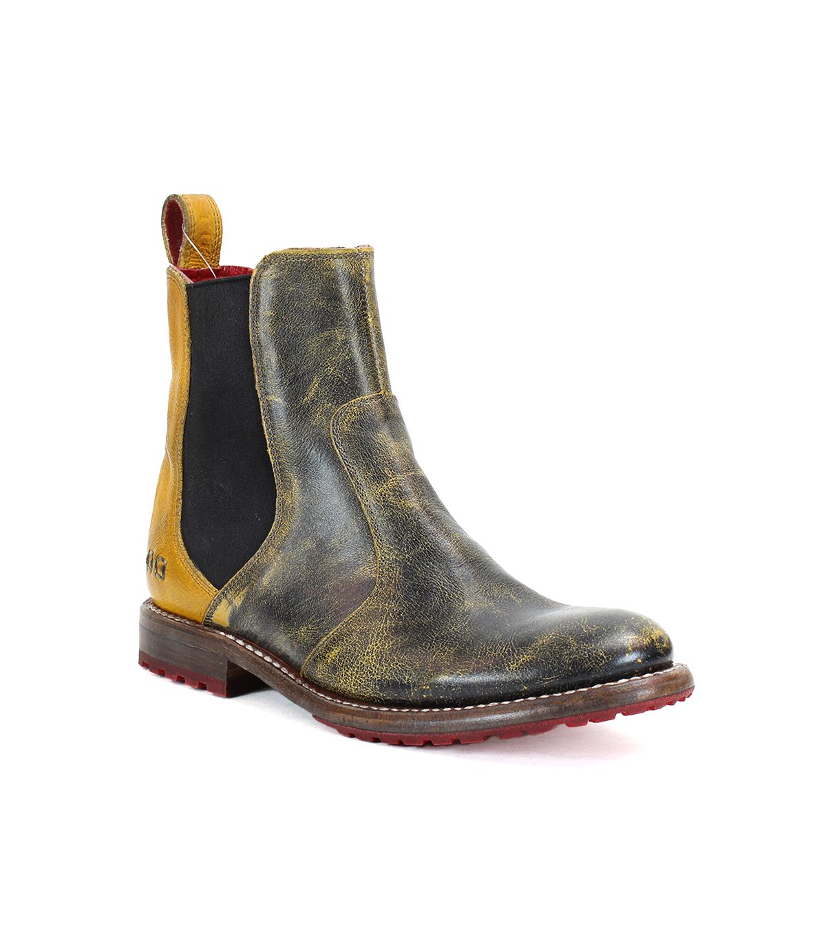 Introducing the Bed|Stü Nandi: a distressed yellow and black Chelsea boot with a convenient slip-on design, elastic side panels, a back pull tab, and a brown sole featuring red treads—displayed against a white background.