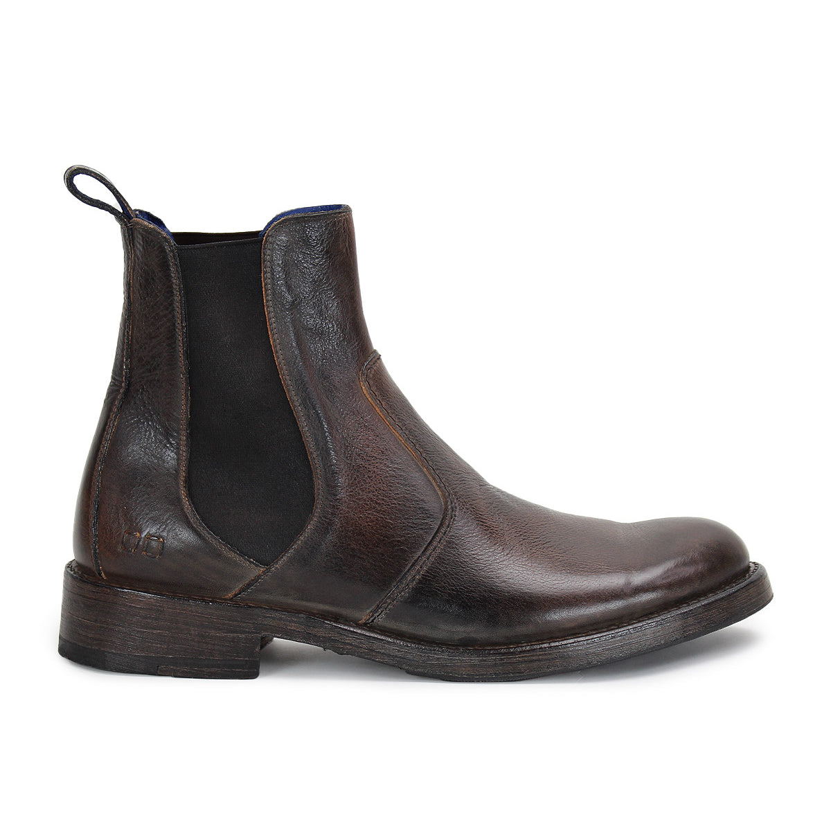 A single Nando Chelsea boot by Bed|Stü, crafted from hand-worked brown leather with black elastic side panels, a rear pull tab, and sturdy Goodyear welt construction, shown in a left side profile view.