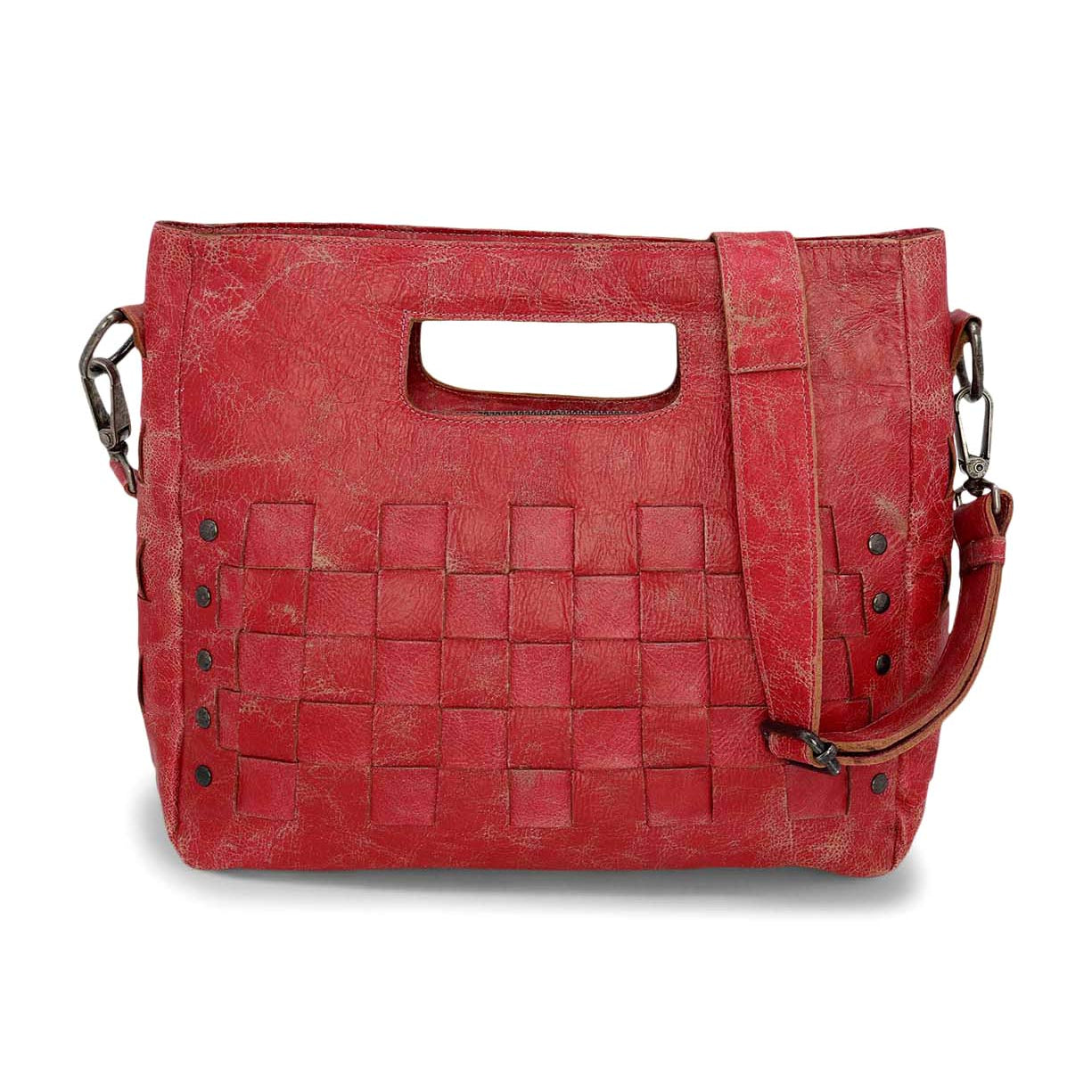 The Bed|Stü Orchid is a red leather handbag with a woven front pattern and an antique metal buckle, featuring a modern timeless design, cutout handle, and detachable shoulder strap, displayed against a white background.