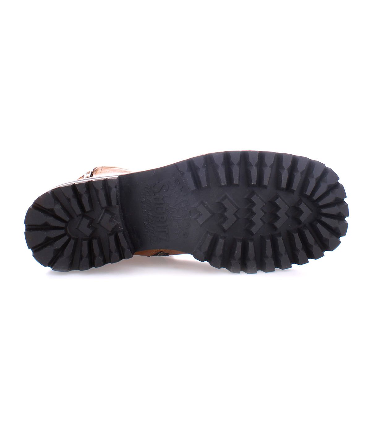 The image shows the bottom sole of the Bed|Stü Ploy boot, featuring brown Italian leather and a thick, black, rugged tread pattern against a white background.