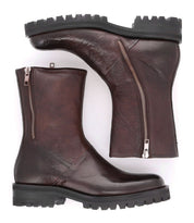 Introducing the Bed|Stü Ploy: a pair of mid-calf, dark brown Italian leather boots with chunky black soles and dual side zippers, featuring a sleek square toe design—shown from both the side and sole views.