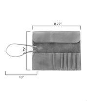 The Bed|Stü Prepped Leather Wrap is a gray leather organizer pouch featuring eight compartments, a secure wrap flap closure, and a convenient handle—perfect for artists who want both style and practicality. Its leather wrap design ensures your supplies stay safe, while generous dimensions of 13 inches wide, 8.25 inches tall, and a 6.75-inch flap section offer plenty of storage space.