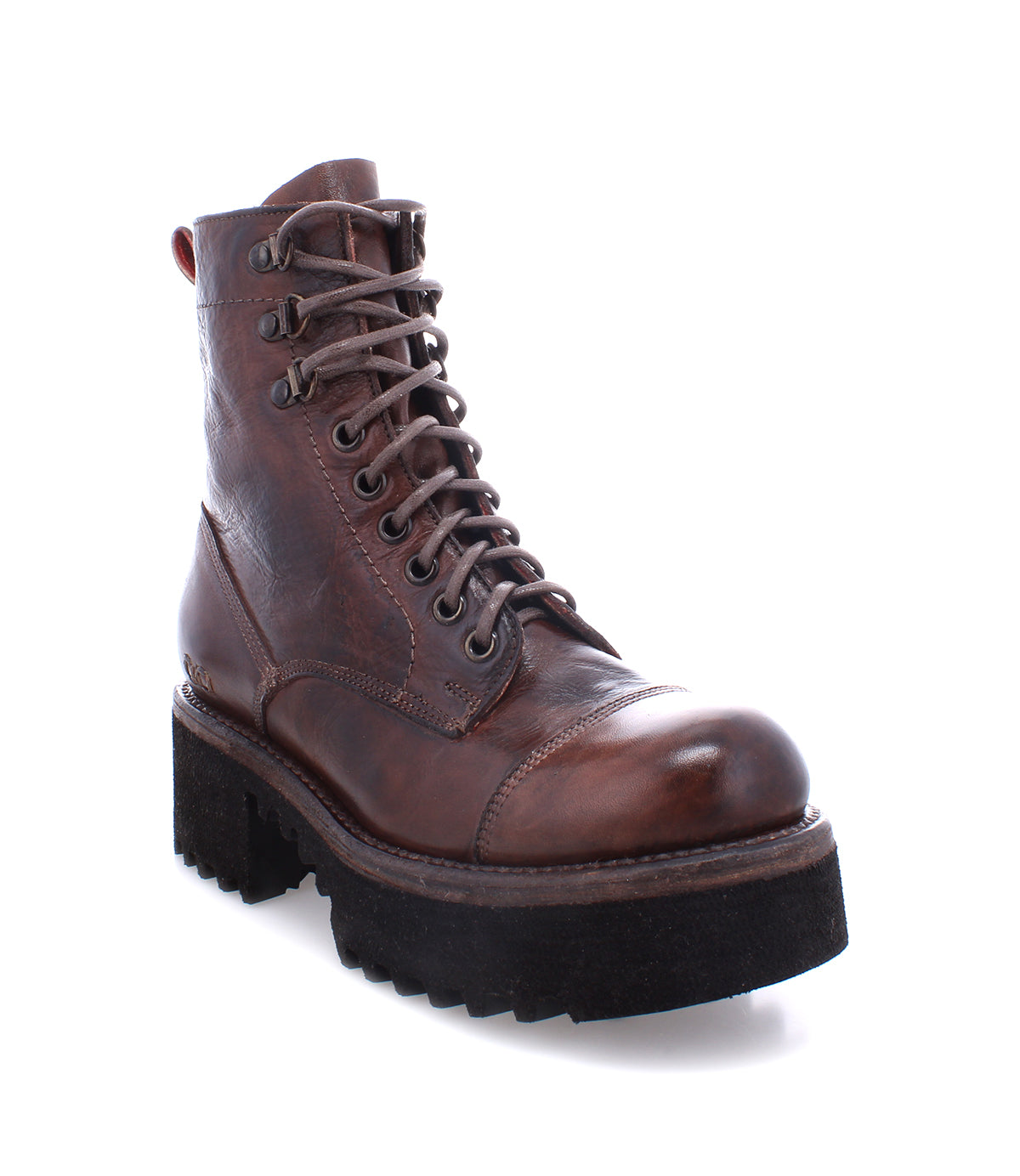 The Prudence Hi by Bed|Stü is a brown leather lace-up combat boot featuring a chunky platform outsole and a thick black treaded sole, displayed at a slight angle on a white background.