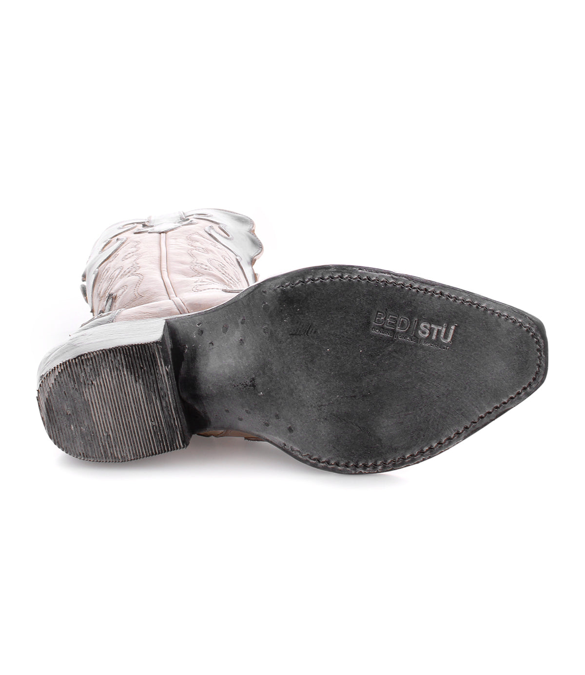 A light-colored Queen Western boot by Bed|Stü, shown from the bottom with a black sole featuring the "BED|STU" stamp near the toe.