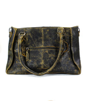 The Rockababy by Bed|Stü is a distressed black compact leather bag, crafted from vegetable-tanned leather, featuring two handles and a front zipper pocket, shown against a white background.