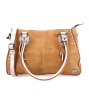 Rockababy by Bed|Stü is a tan leather handbag featuring white stitching details, double handles, and an adjustable crossbody strap, expertly crafted from premium vegetable-tanned leather and displayed against a white background.