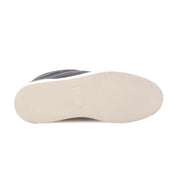 The image shows the bottom view of the Bed|Stü Rossela sneaker, which features a flat, white rubber sole with thin horizontal grooves for traction.